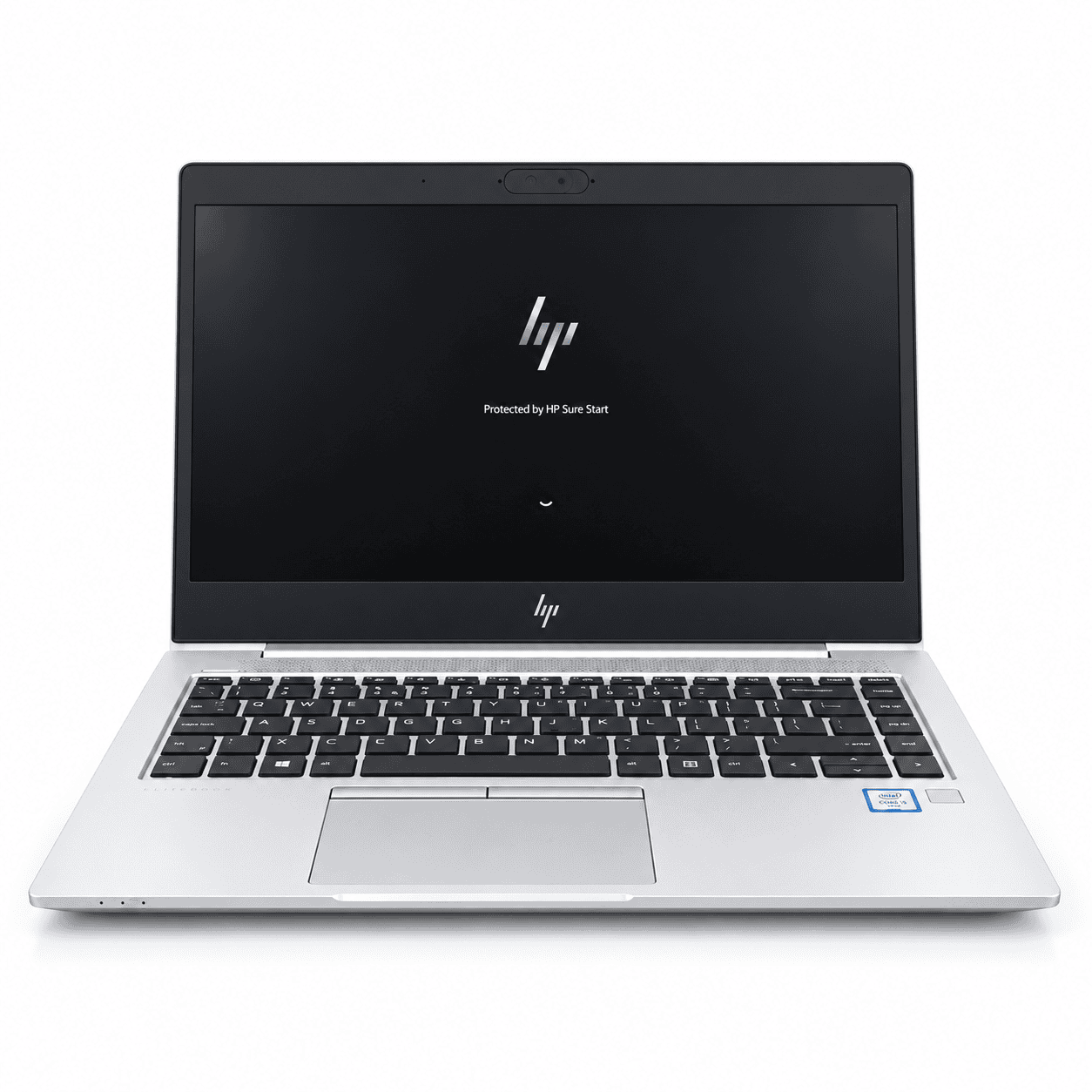 an open silver laptop on a white studio backdrop